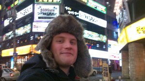 Its about -8 degrees here in Seoul. Here i'm wearing my hat from friends. Most streets look like the street behind me.
